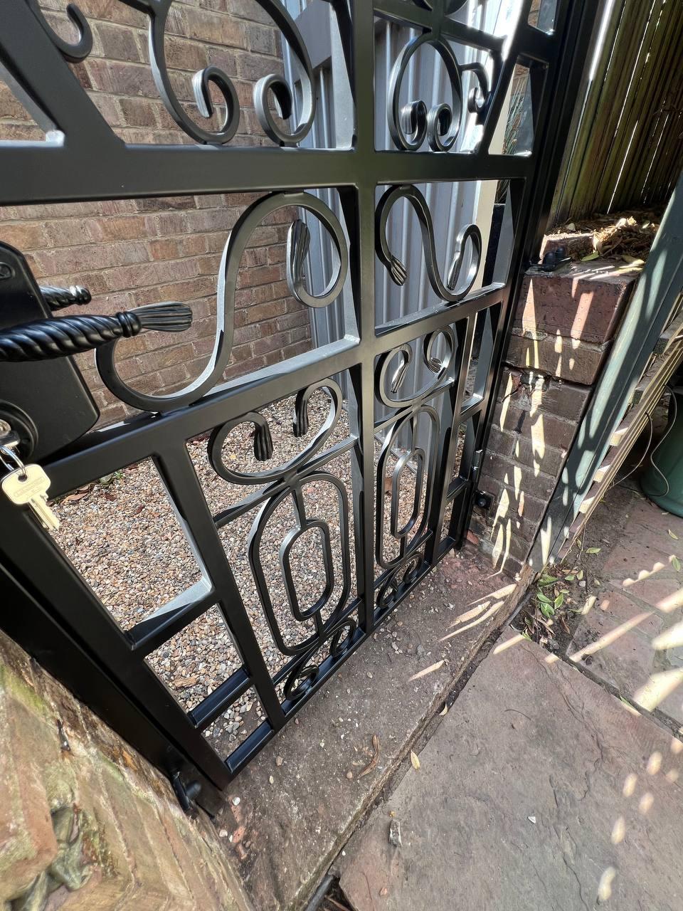 Black Heath Metalworks installed the completed gate within the existing garden entrance and fitted the locking hardware.